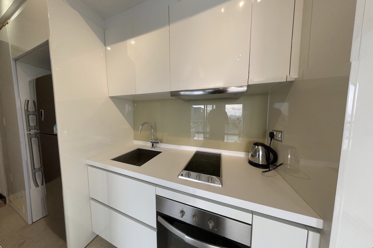 Modern kitchen with premium appliances and marble countertops